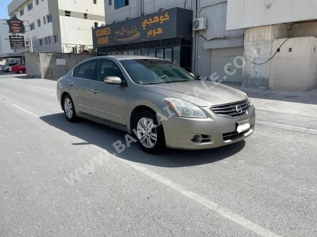 Nissan  Altima  S  2011  Sedan  Automatic  4  220,100  FWD  Beige  Gasoline