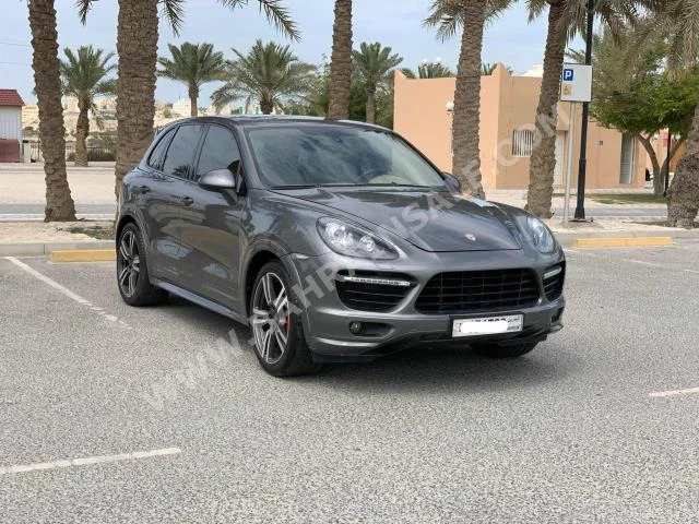 بورش  كيان  2014  اس يو في  اتوماتك  8  99,950  دفع أمامي  رمادي  بنزين