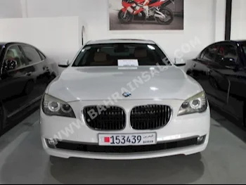 BMW  7-Series  735 Li  2011  Sedan  Automatic  6  100,000  RWD  White  Gasoline