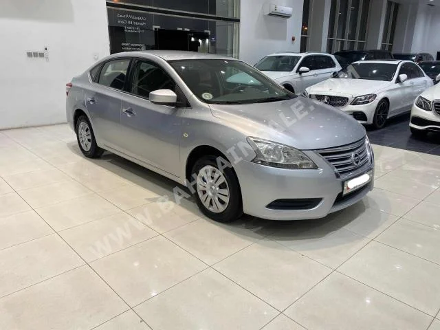 Nissan  Sentra  2015  Sedan  Automatic  4  100,800  FWD  Silver  Gasoline