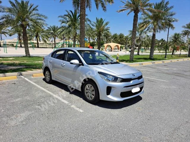 Kia  Rio  2018  Sedan  Automatic  4  141,800  FWD  Silver  Gasoline