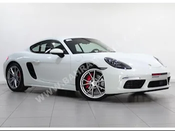 Porsche  Cayman  S  2017  Coupe / Sport  Automatic  6  5,300  RWD  White  Gasoline