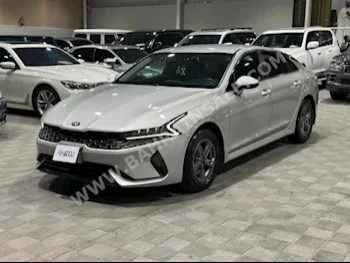 Kia  Optima  2.0  2021  Sedan  Automatic  4  135,000  FWD  Silver  Gasoline