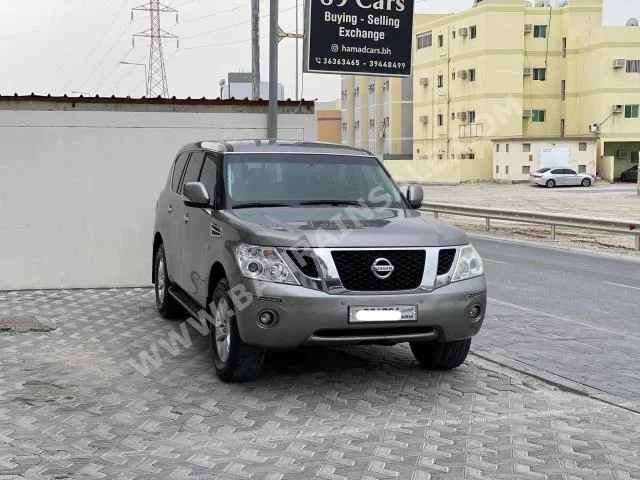 Nissan  Patrol  SE  2013  SUV  Automatic  8  196,400  AWD  Gray  Gasoline