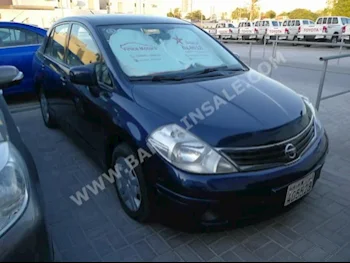 Nissan  Tiida  2012  Sedan  Automatic  4  123,000  FWD  Dark Blue  Gasoline
