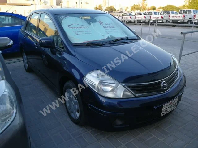 Nissan  Tiida  2012  Sedan  Automatic  4  123,000  FWD  Dark Blue  Gasoline