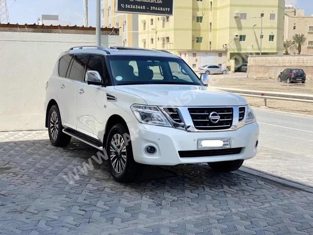 Nissan  Patrol  Platinum  2016  SUV  Automatic  8  129,600  AWD  White  Gasoline