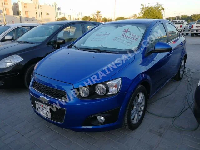 Chevrolet  Sonic  2013  Sedan  Automatic  4  48,000  FWD  Blue  Gasoline