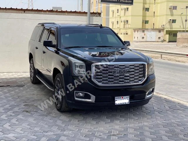 GMC  Yukon  XL  2019  SUV  Automatic  8  112,000  4WD  Black  Gasoline