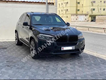 BMW  X-Series  5  2014  SUV  Automatic  8  100,100  AWD  Gray  Gasoline