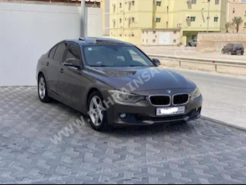 BMW  3-Series  320i  2014  Sedan  Automatic  4  114,500  FWD  Brown  Gasoline