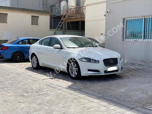 Jaguar  XF  2012  Sedan  Automatic  6  53,100  RWD  White  Gasoline