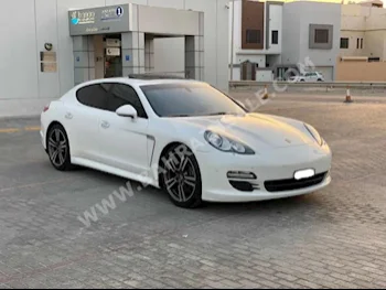 Porsche  Panamera  2012  Sedan  Automatic  6  122,500  RWD  White  Gasoline