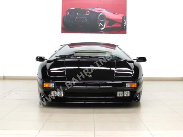 Lamborghini  Diablo  1993  Coupe / Sport  F-1  12  16,000  AWD  Black  Gasoline