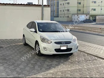 Hyundai  Accent  2013  Sedan  Automatic  4  99,400  FWD  White  Gasoline