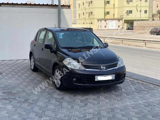 Nissan  Tiida  2011  Hatchback  Automatic  4  95,050  FWD  Brown  Gasoline