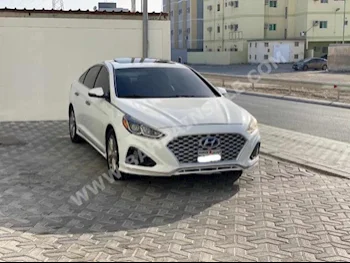 Hyundai  Sonata  2018  Sedan  Automatic  4  90,850  FWD  White  Gasoline