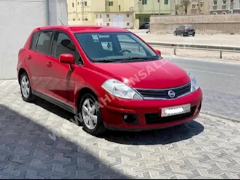 Nissan  Tiida  2011  Hatchback  Automatic  4  135,700  FWD  Red  Gasoline