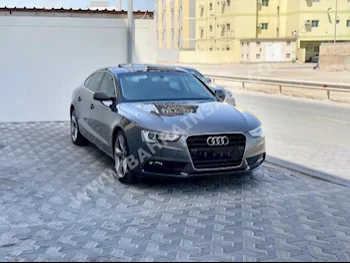 Audi  A5  1.8  2015  Sedan  Automatic  4  103,000  FWD  Gray  Gasoline