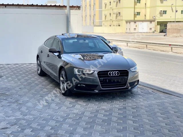 Audi  A5  1.8  2015  Sedan  Automatic  4  103,000  FWD  Gray  Gasoline