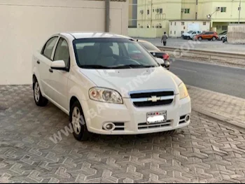 Chevrolet  Aveo  LS  2015  Sedan  Automatic  4  77,500  FWD  White  Gasoline