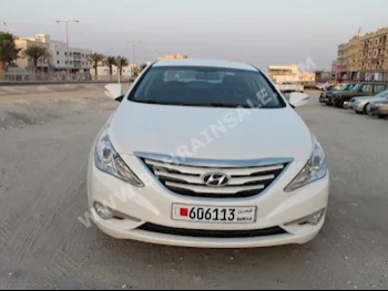 Hyundai  Sonata  2015  Sedan  Automatic  4  60,000  FWD  White  Gasoline