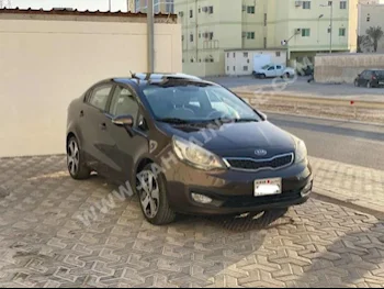 Kia  Rio  2013  Sedan  Automatic  4  136,000  FWD  Brown  Gasoline