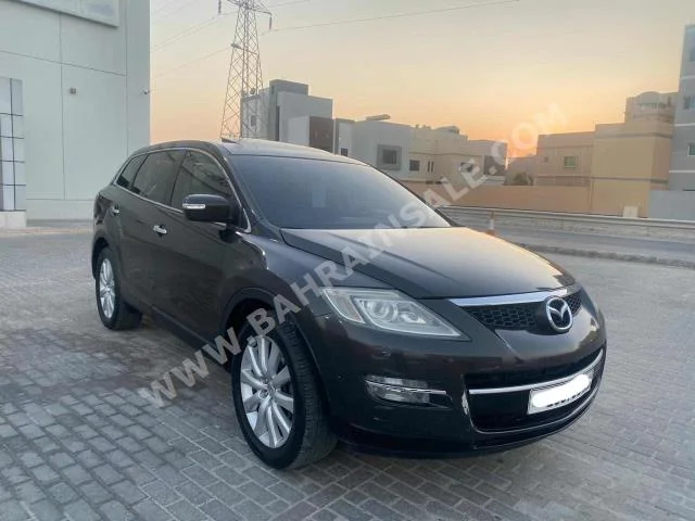 Mazda  CX  9  2009  SUV  Automatic  6  182,300  RWD  Black  Gasoline