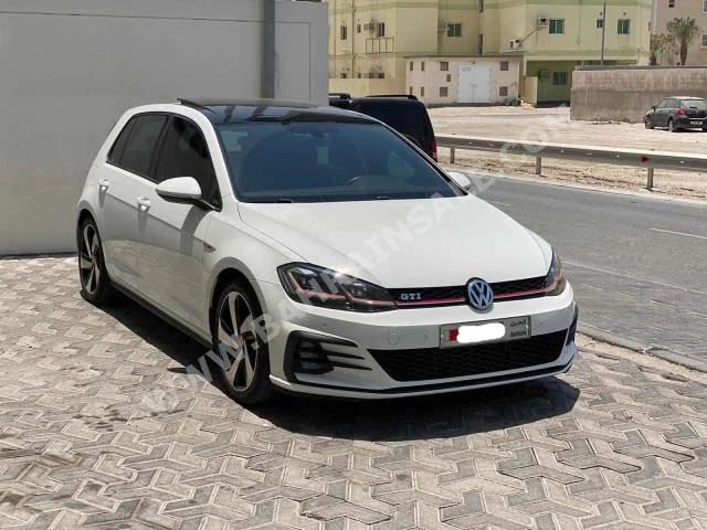 Volkswagen  Golf  GTI  2018  Hatchback  Automatic  4  98,000  FWD  White  Gasoline