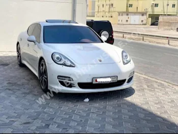 Porsche  Panamera  2012  Sedan  Automatic  6  146,200  RWD  White  Gasoline