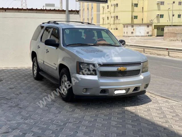 Chevrolet  Tahoe  LT  2014  SUV  Automatic  8  211,050  RWD  Silver  Gasoline