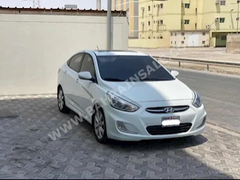 Hyundai  Accent  1.6  2015  Sedan  Automatic  4  217,200  FWD  White  Gasoline