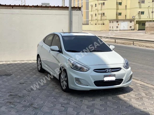 Hyundai  Accent  1.6  2015  Sedan  Automatic  4  217,200  FWD  White  Gasoline