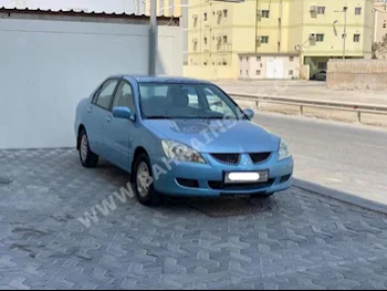 Mitsubishi  Lancer  2004  Sedan  Automatic  4  319,750  FWD  Blue  Gasoline