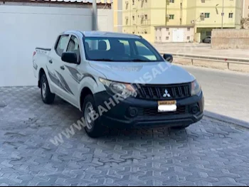 Mitsubishi  L 200  2016  Pick Up  Manual  4  103,750  RWD  White  Gasoline