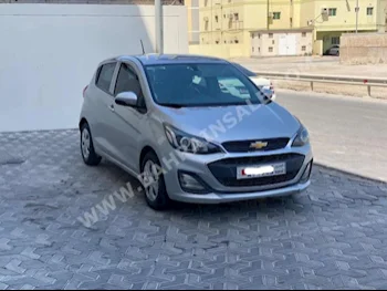 Chevrolet  Spark  2019  Hatchback  Automatic  4  122,300  FWD  Silver  Gasoline