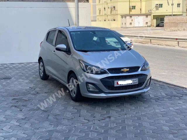 Chevrolet  Spark  2019  Hatchback  Automatic  4  122,300  FWD  Silver  Gasoline