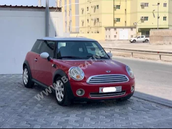 Mini  Cooper  2010  Hatchback  Automatic  4  143,700  FWD  Red  Gasoline