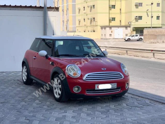 Mini  Cooper  2010  Hatchback  Automatic  4  143,700  FWD  Red  Gasoline