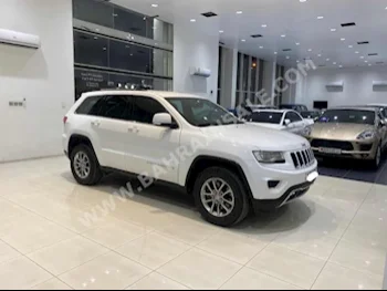 Jeep  Grand Cherokee  Laredo  2015  Hatchback  Automatic  4  210,000  FWD  White  Gasoline
