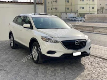 مازدا  سي اكس  9  2014  اس يو في  اتوماتك  6  122,000  دفع خلفي  أبيض  بنزين