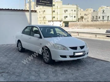 متسوبيشي  لانسر  2006  سيدان  اتوماتك  4  195,950  دفع أمامي  أبيض  بنزين