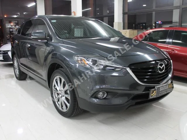 Mazda  CX  9  2015  SUV  Automatic  6  17,000  AWD  Gray  Gasoline