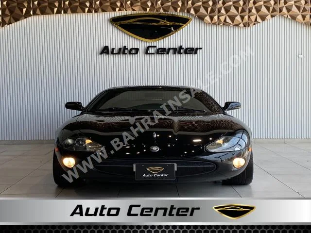 Jaguar  XK  8  1997  Coupe / Sport  Automatic  8  124,000  RWD  Black  Gasoline