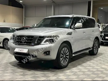 Nissan  Armada  SE  2012  SUV  Automatic  8  95,000  4WD  Silver  Gasoline