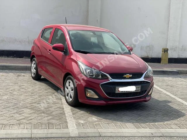 Chevrolet  Spark  2019  Hatchback  Automatic  4  90,000  FWD  Red  Gasoline