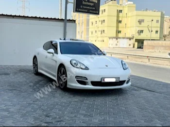 Porsche  Panamera  2012  Sedan  Automatic  6  146,200  RWD  White  Gasoline