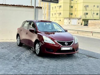 Nissan  Tiida  2014  Hatchback  Automatic  4  104,000  FWD  Red  Gasoline