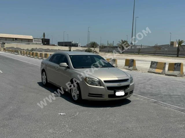 Chevrolet  Malibu  2011  Sedan  Automatic  4  133,000  FWD  Gold  Gasoline