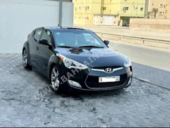 Hyundai  Veloster  2017  Hatchback  Automatic  4  141,650  FWD  Black  Gasoline